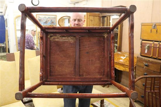 A pair of Chinese hardwood elbow chairs,